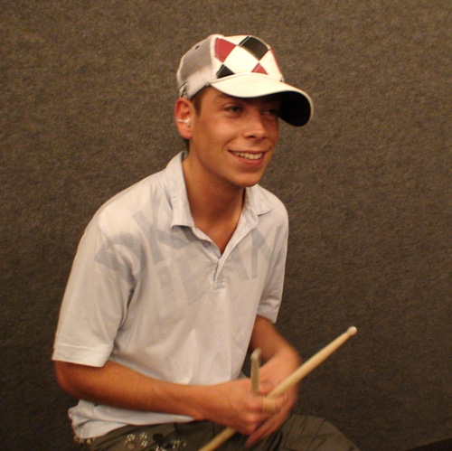 Jonny holding sticks